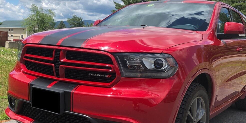 racing stripes on red dodge car