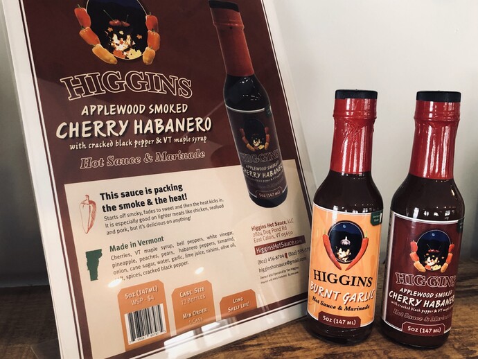 Higgins Hot Sauce branding and bottles